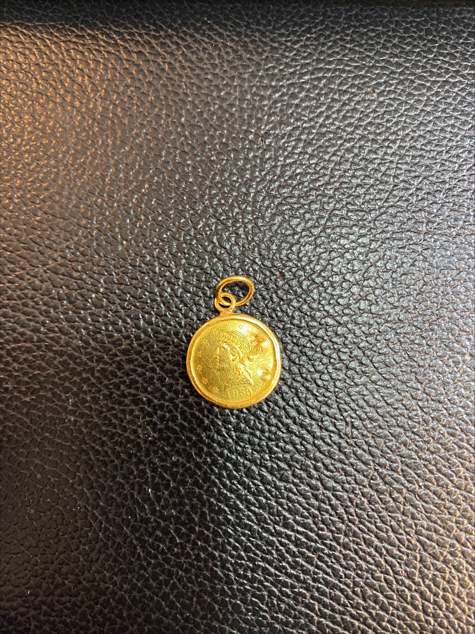 916 coin pendant