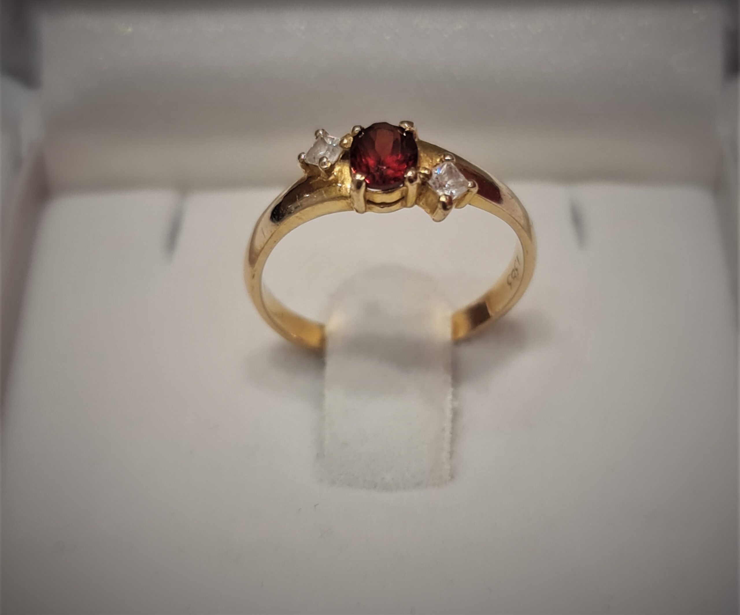 K14 gold ring with red gemstone
