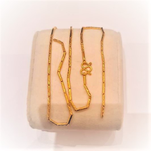 broken gold necklace with chinese seal