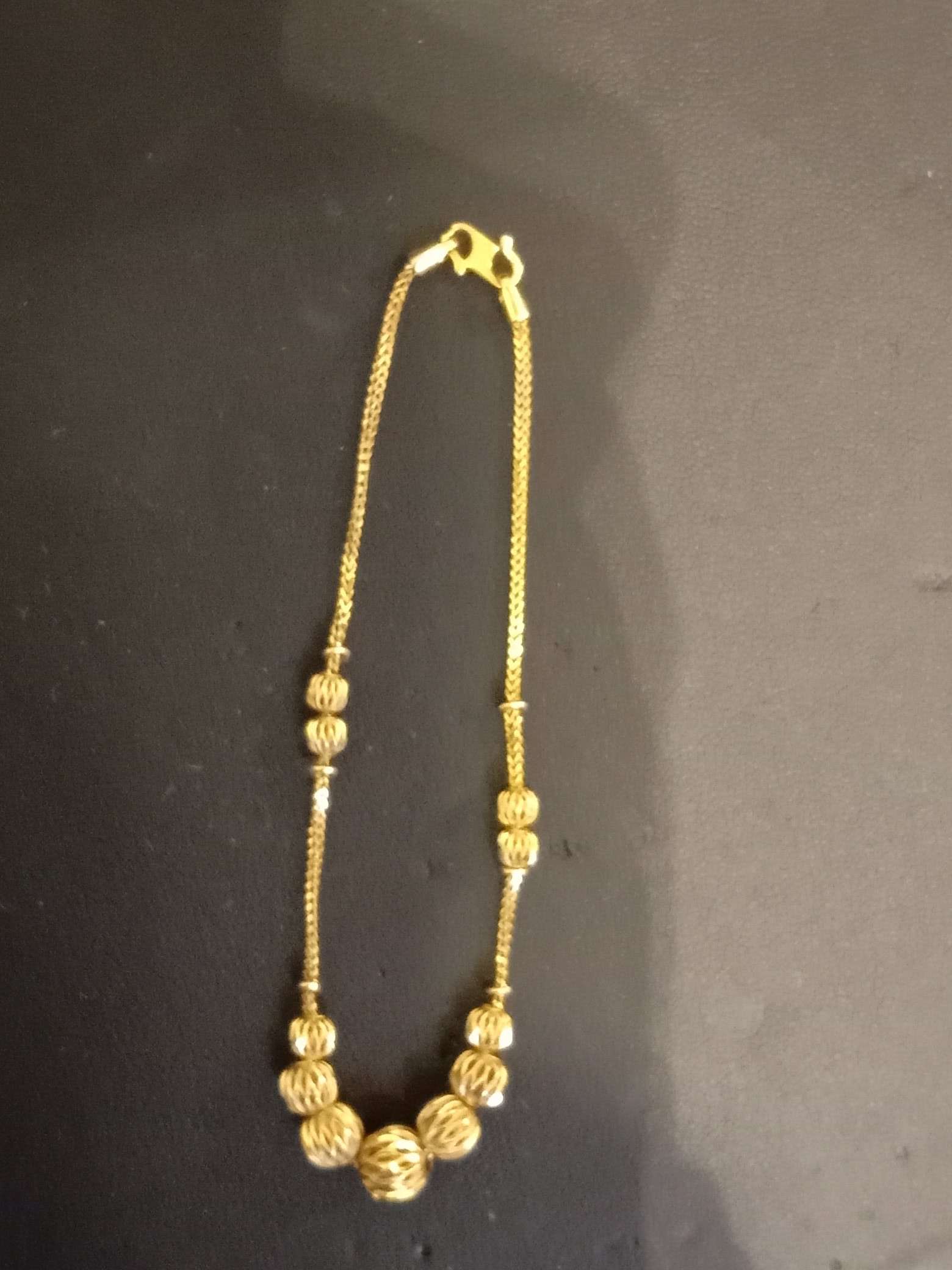 916 gold bracelet with ball design