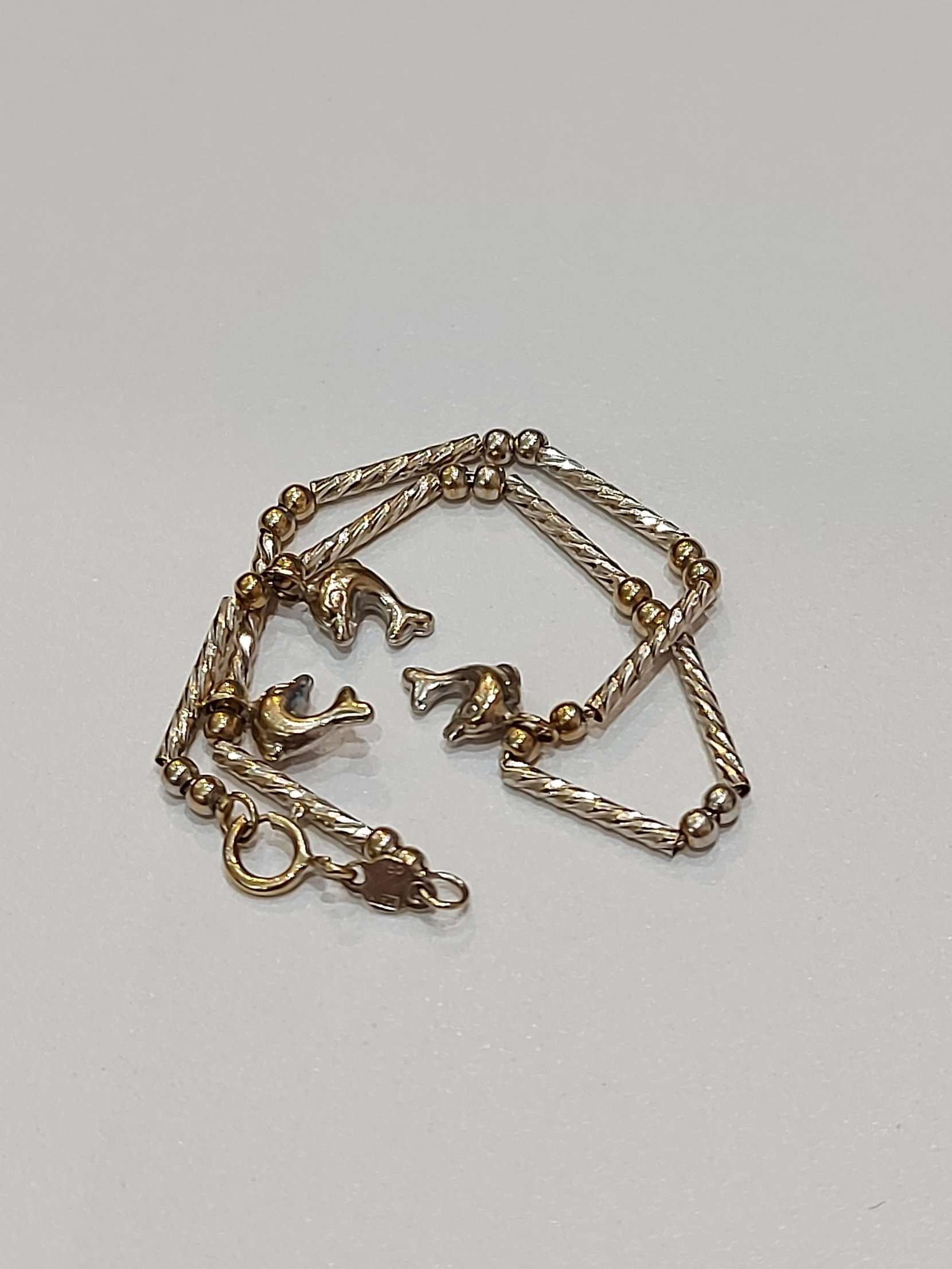 750 white gold dolphin bracelet