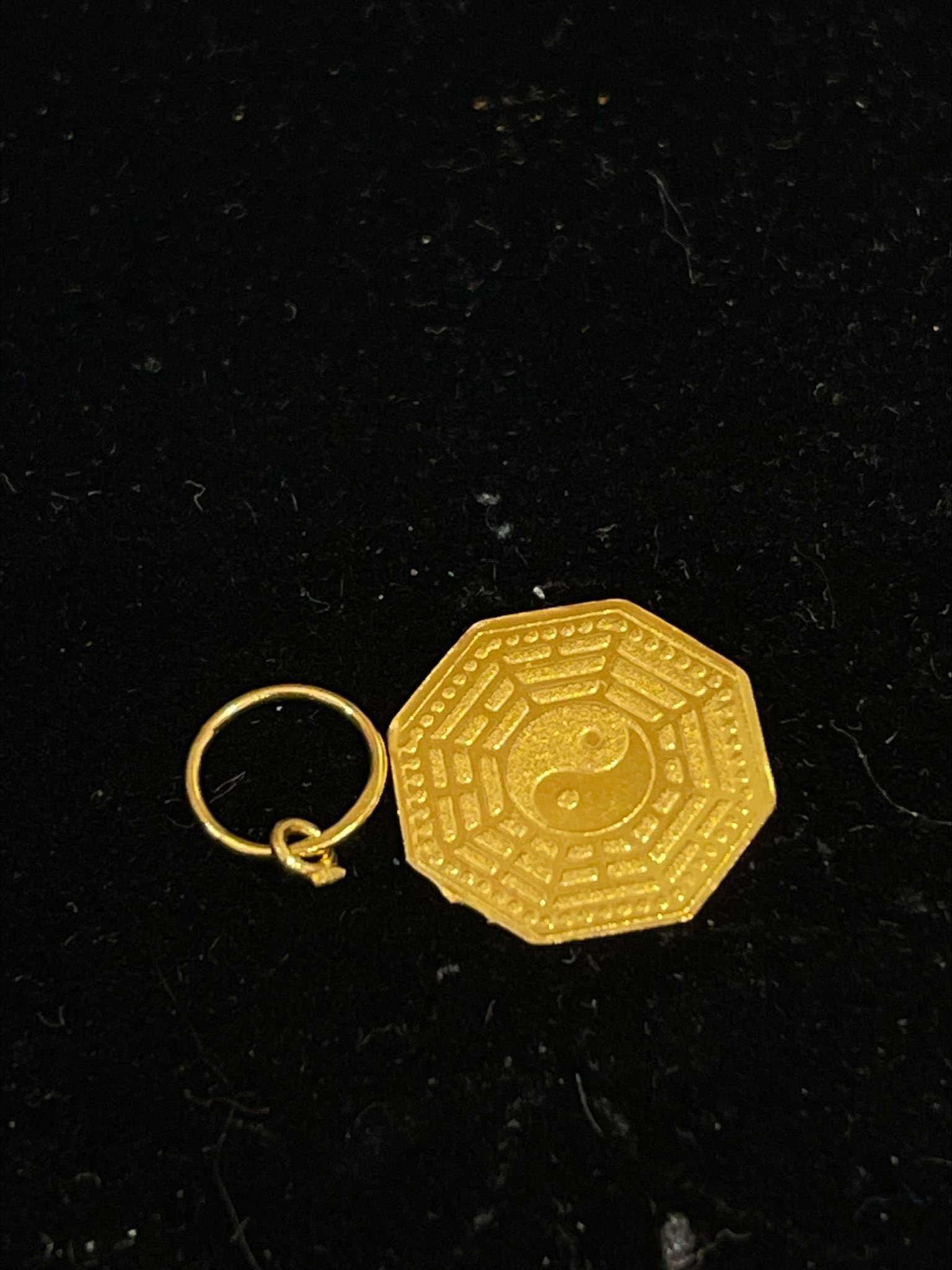 Broken gold pendant