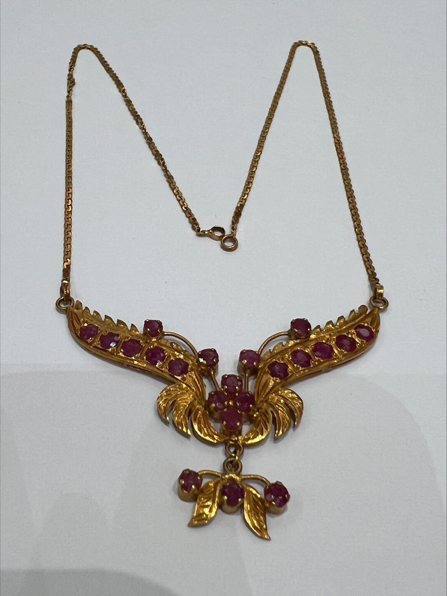 gold necklace with stones