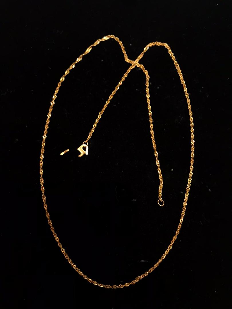 broken K22 gold necklace