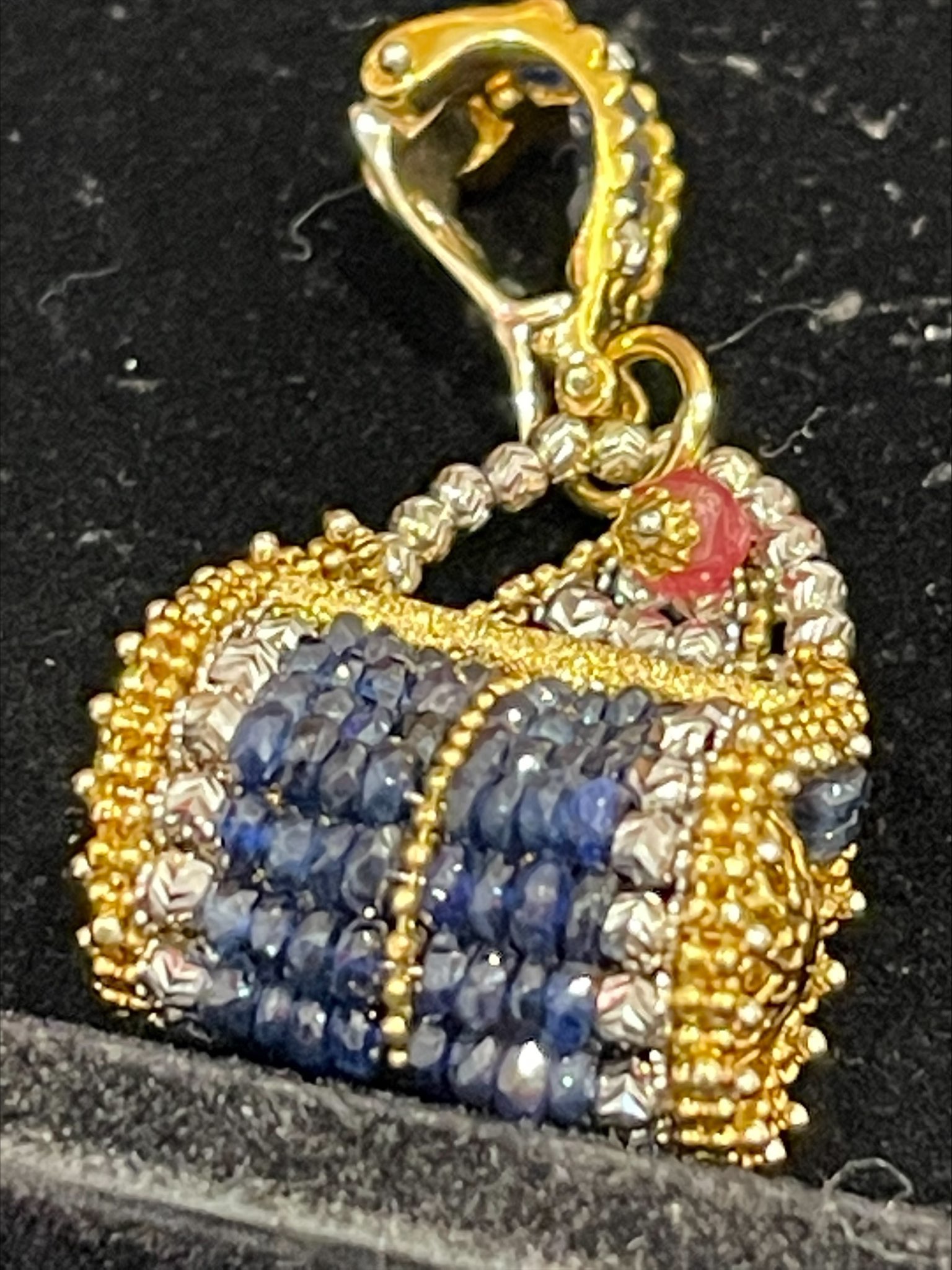 K18 gold pendant with colored stone
